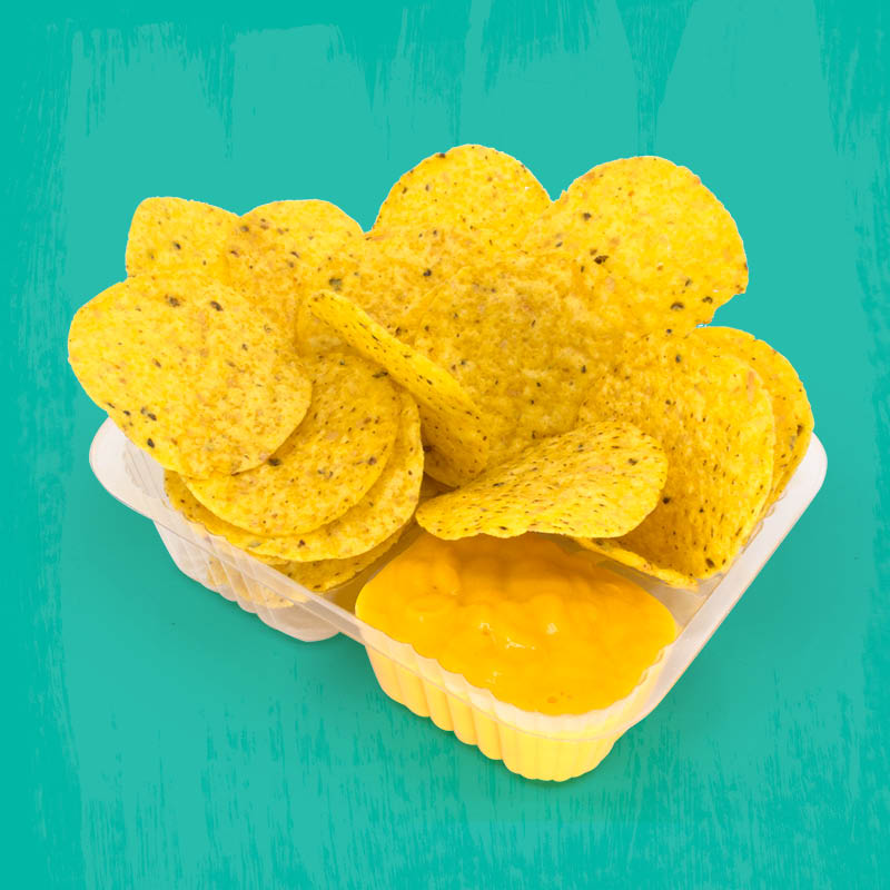 Tray of nachos on a blue background 