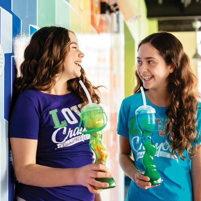 Two girls holding ICEEs