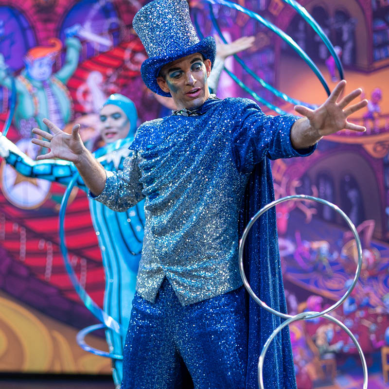 Magician in a blue outfit 